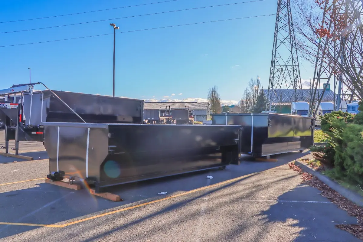 Roll-off dumpster ready for waste disposal at job site for Demolition Dumpster Rental in Taylor